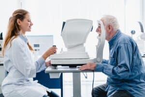 Senior man having a glaucoma screening done by his ophthalmologist